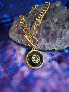 COLGANTE HEXAGRAMA DE ACERO Y TURMALINA.