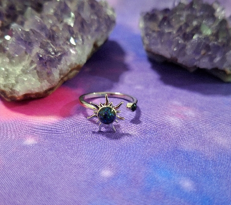 ANILLO CON SOL GIRATORIO Y TURMALINA