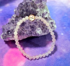 PULSERA DE CUARZO ROSA CON YIN YANG DE ACERO INOXIDABLE