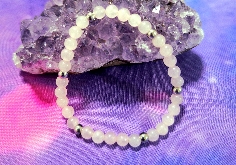 PULSERA DE CUARZO ROSA Y ACERO INOXIDABLE