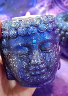 ORGONITA PORTAVELAS CABEZA DE BUDA